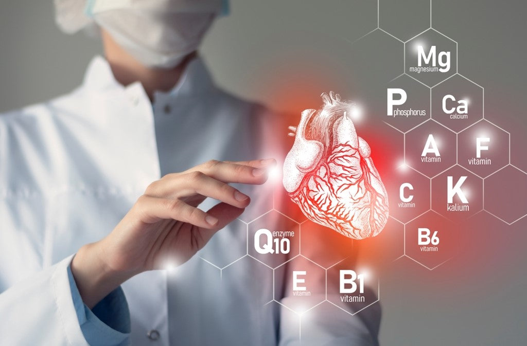 doctor with heart and other body micronutrients on virtual screen