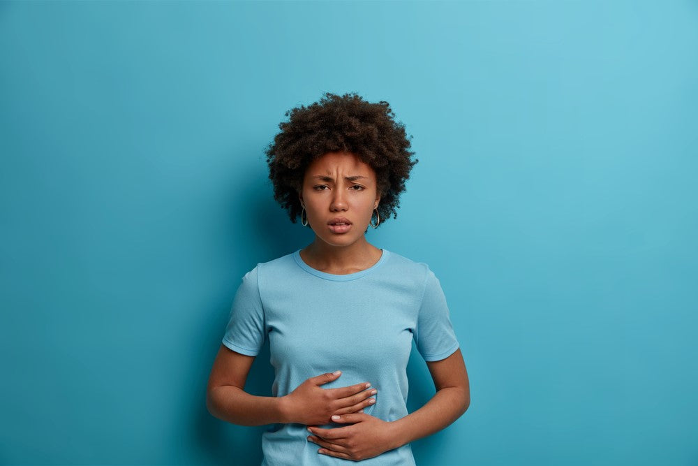 women with upset stomach